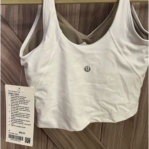 lululemon Align Tank. Size 4. NEW WITH TAGS! Beautiful white, with taupe inside